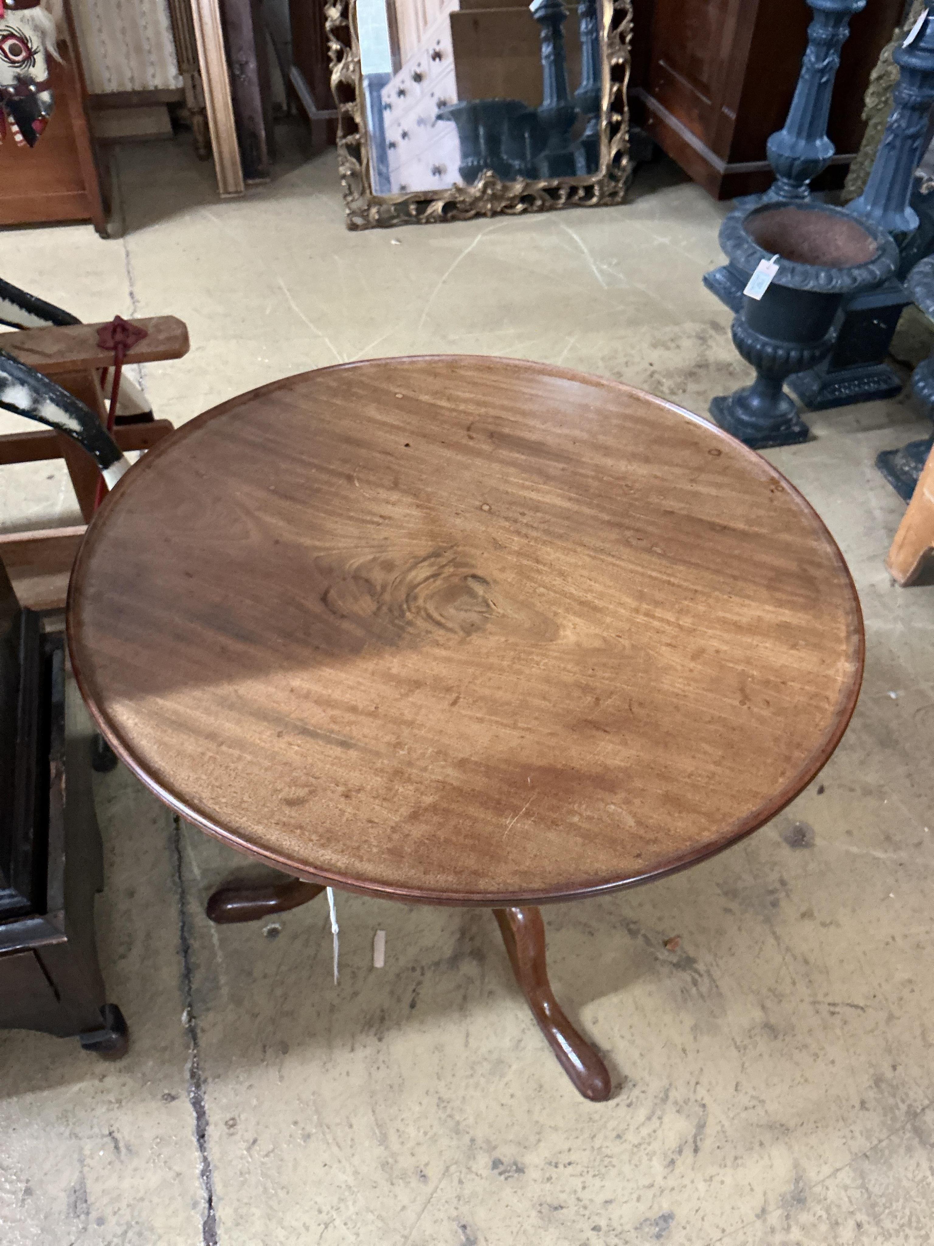 A George III circular mahogany tilt top tripod birdcage tea table, diameter 79cm, height 69cm